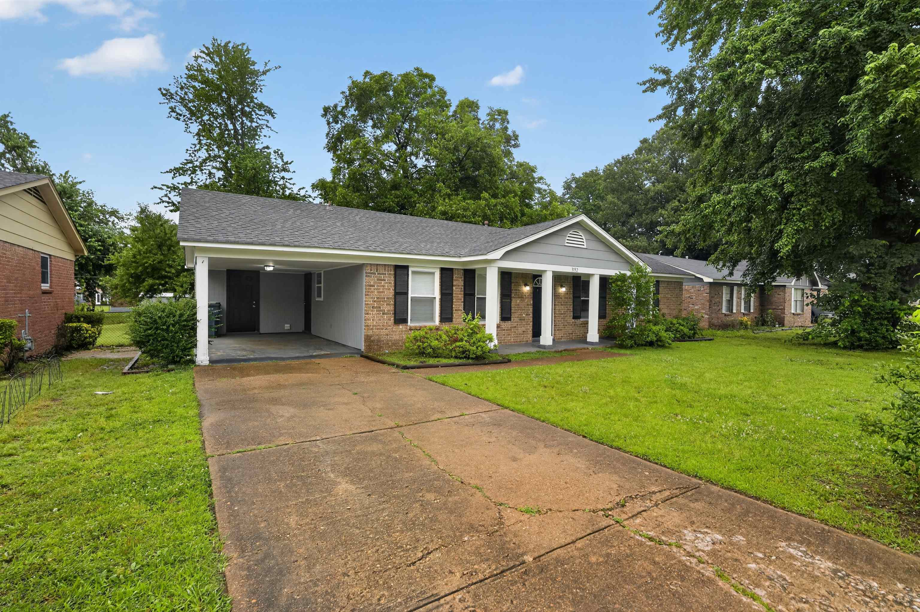 3152 Mackham Avenue Memphis, TN 38118 - Photo 3 of 16 Brick exterior with gabled entry featuring column supports