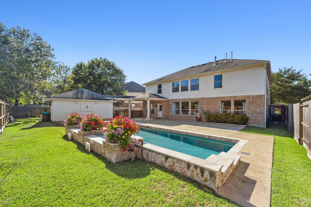 31306 Summit Grove Lane Spring, TX 77386 - Photo 23 of 45 a front view of a house with garden