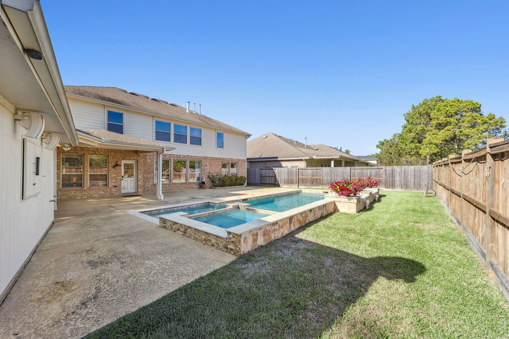 31306 Summit Grove Lane Spring, TX 77386 - Photo 24 of 45 a front view of building with yard