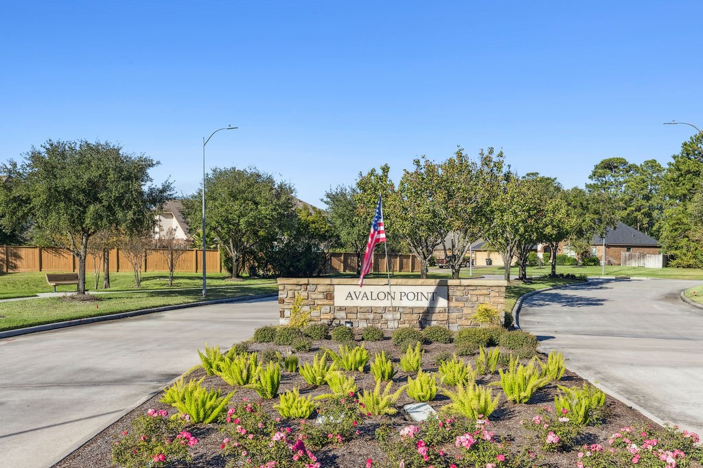 31306 Summit Grove Lane Spring, TX 77386 - Photo 27 of 45 a front view of a house with a yard and fountain
