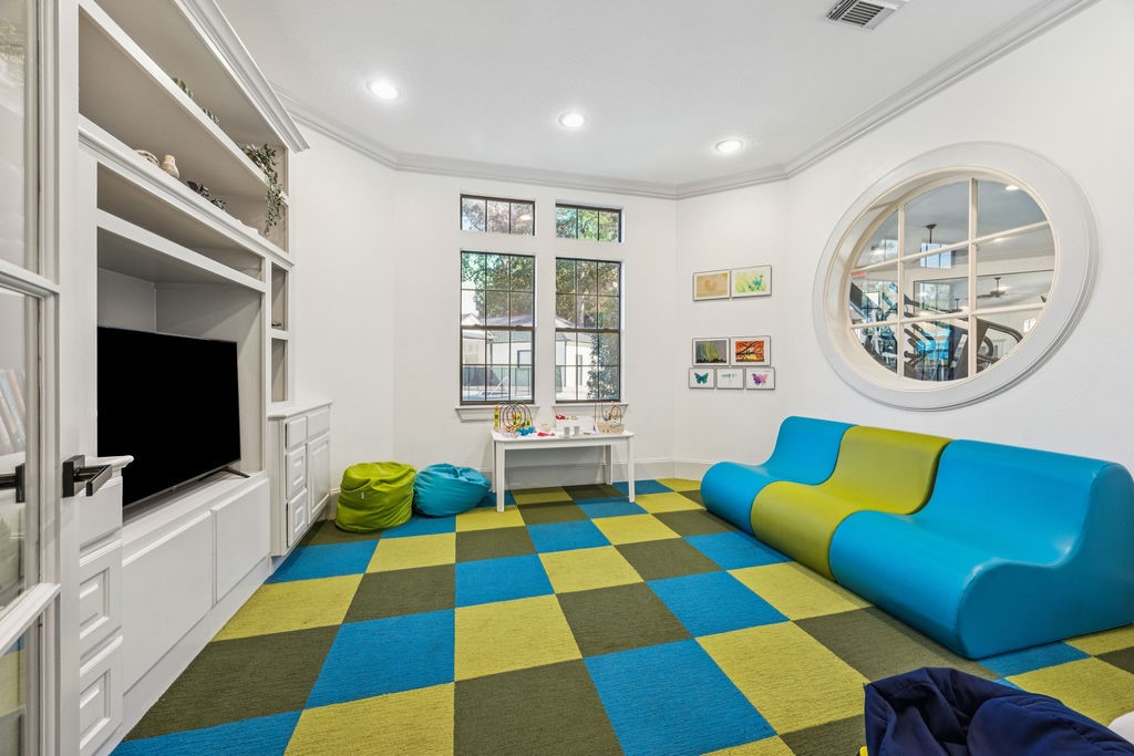 31306 Summit Grove Lane Spring, TX 77386 - Photo 38 of 45 a bedroom with a bed and a flat screen tv