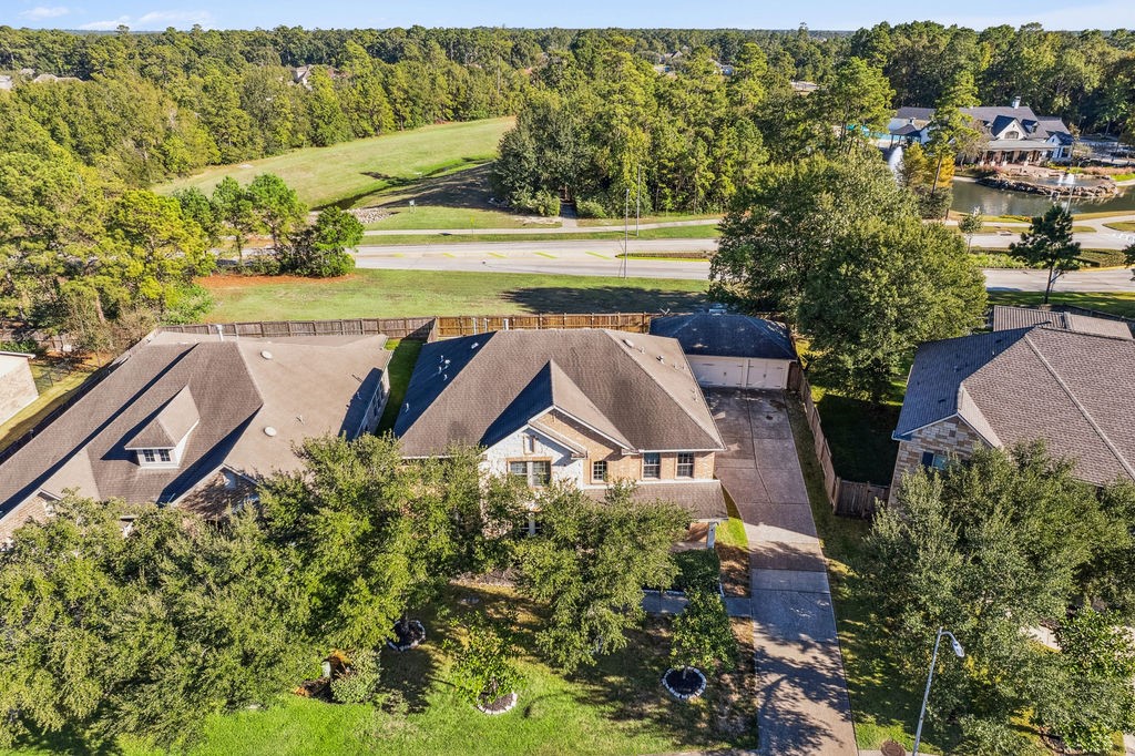 31306 Summit Grove Lane Spring, TX 77386 - Photo 41 of 45 a view of swimming pool with a yard and outdoor seating