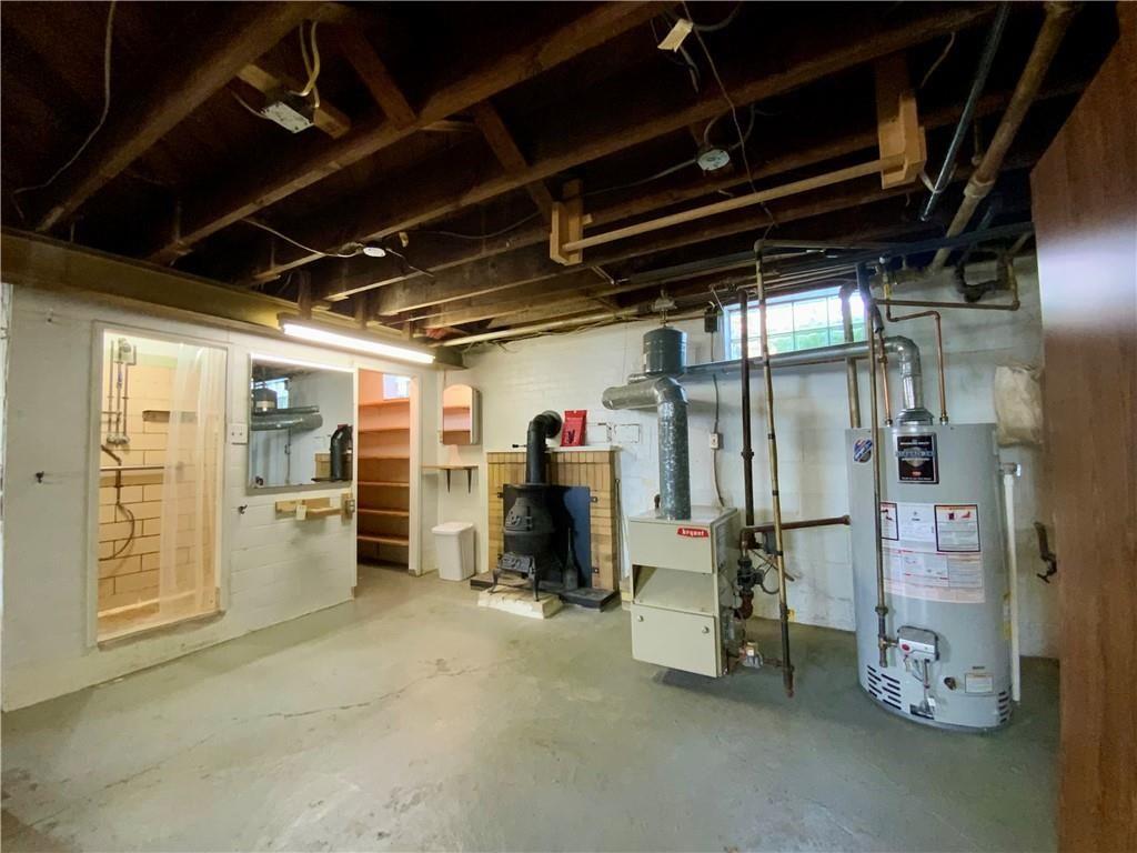 629 Ridge Road Ambridge, PA 15003 - Photo 27 of 40 Extra shower, wood burner in the basement