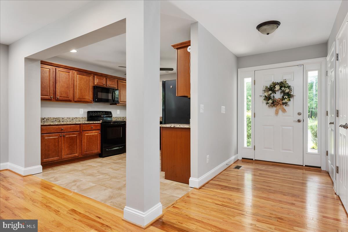 115 Rebel Road Grasonville, MD 21638 - Photo 37 of 37 Inviting Foyer expands to OPEN floor plan