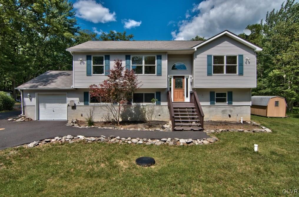 4913 Pine Ridge Drive West Bushkill, PA 18324 - Photo 1 of 50 6BD/2.5BTH w/ 1 car garage w/ paved driveway in Pi