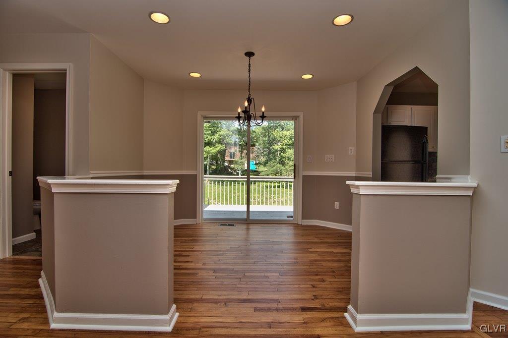 4913 Pine Ridge Drive West Bushkill, PA 18324 - Photo 12 of 50 The dining area also features a decorative knee wa
