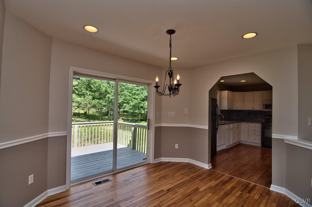 4913 Pine Ridge Drive West Bushkill, PA 18324 - Photo 13 of 50 Easily entertain w/ the kitchen that leads to the