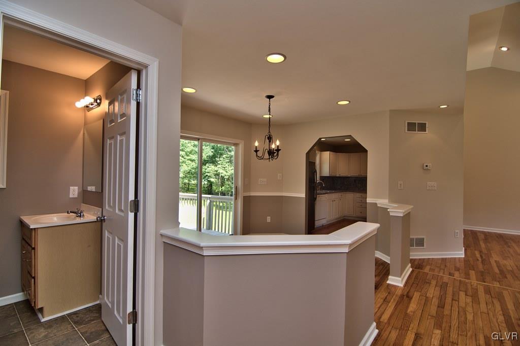 4913 Pine Ridge Drive West Bushkill, PA 18324 - Photo 15 of 50 View of the half bath off the hallway which looks