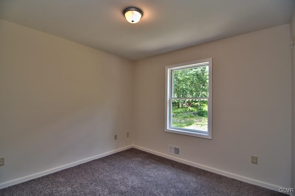 4913 Pine Ridge Drive West Bushkill, PA 18324 - Photo 19 of 50 Bedroom 2 features W2W carpet, fresh paint, 1 wndw
