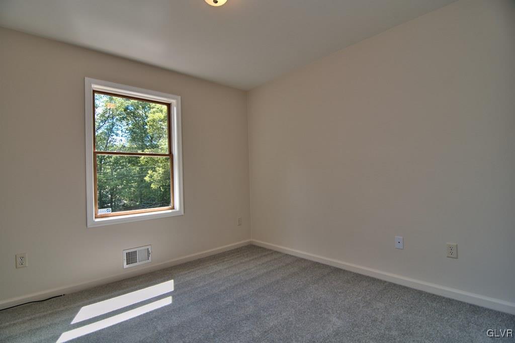 4913 Pine Ridge Drive West Bushkill, PA 18324 - Photo 21 of 50 Bedroom 3 features W2W carpet, fresh paint, 1 wind