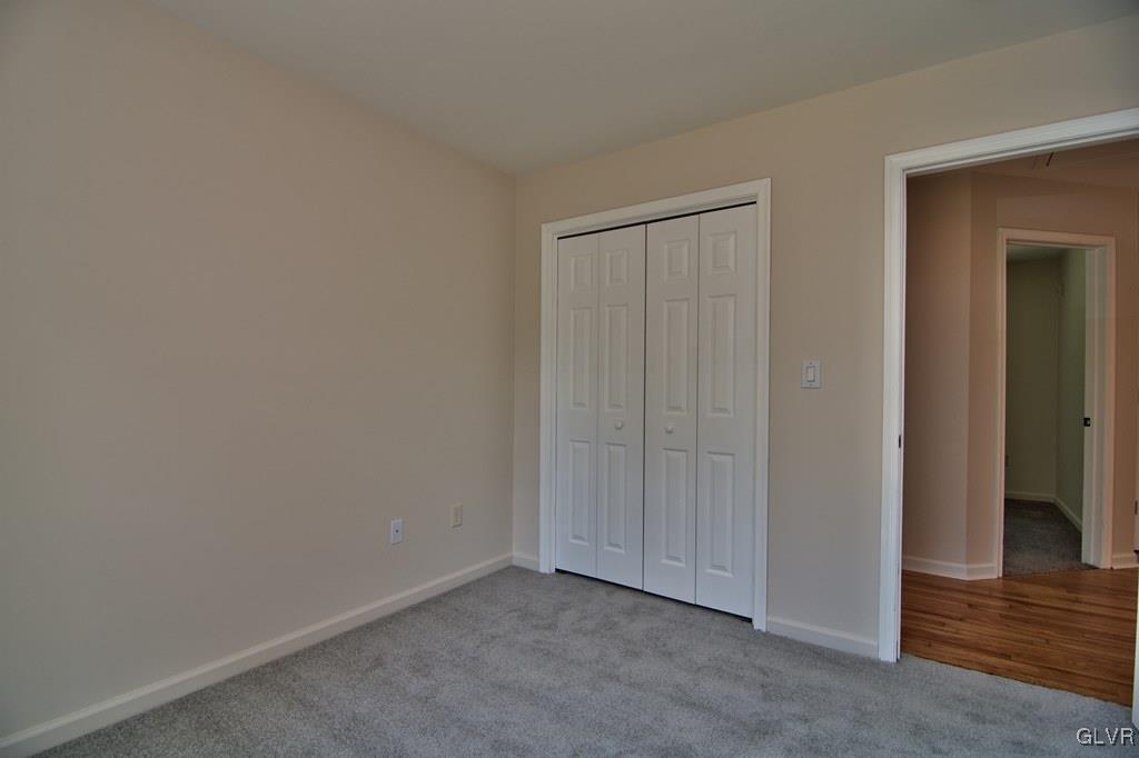 4913 Pine Ridge Drive West Bushkill, PA 18324 - Photo 22 of 50 Bedroom 3 is front-facing, has a double closet & c