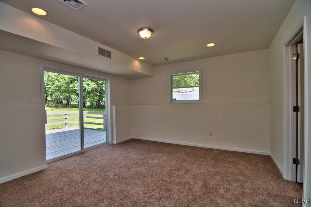 4913 Pine Ridge Drive West Bushkill, PA 18324 - Photo 27 of 50 The Master features new W2W carpet, recessed light