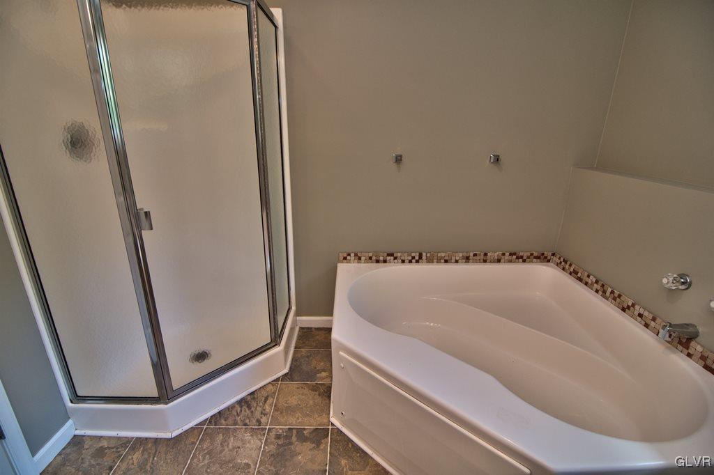4913 Pine Ridge Drive West Bushkill, PA 18324 - Photo 32 of 50 View of the shower w/ glass doors and corner soaki