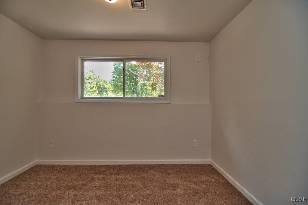 4913 Pine Ridge Drive West Bushkill, PA 18324 - Photo 33 of 50 Bedroom 4 features new W2W carpet, fresh paint, ne