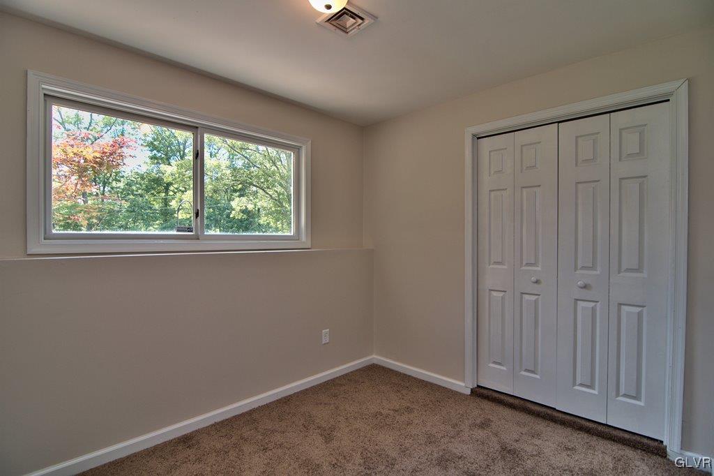 4913 Pine Ridge Drive West Bushkill, PA 18324 - Photo 35 of 50 Bedroom 5 features new W2W carpet, fresh paint, ne