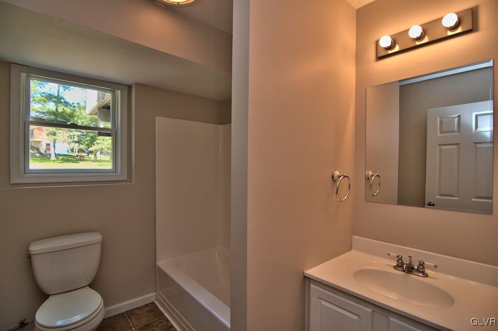 4913 Pine Ridge Drive West Bushkill, PA 18324 - Photo 38 of 50 View of the vanity w/ storage and lighted mirror i