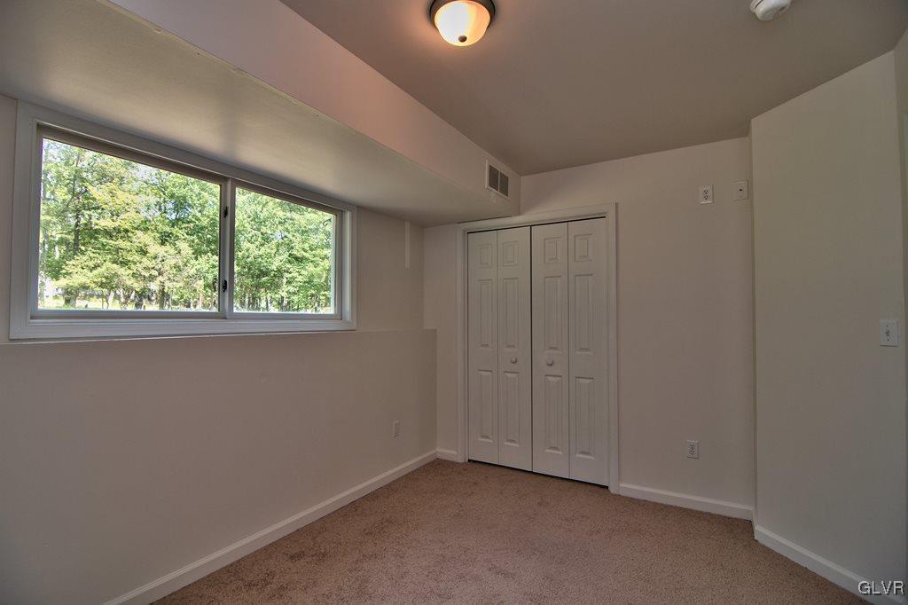 4913 Pine Ridge Drive West Bushkill, PA 18324 - Photo 39 of 50 Bedroom 6 features new W2W carpet, fresh paint, ne