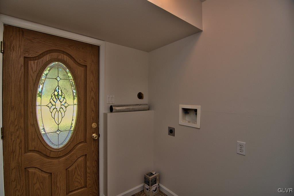 4913 Pine Ridge Drive West Bushkill, PA 18324 - Photo 41 of 50 The lower level laundry/mud rm has a vinyl floor a