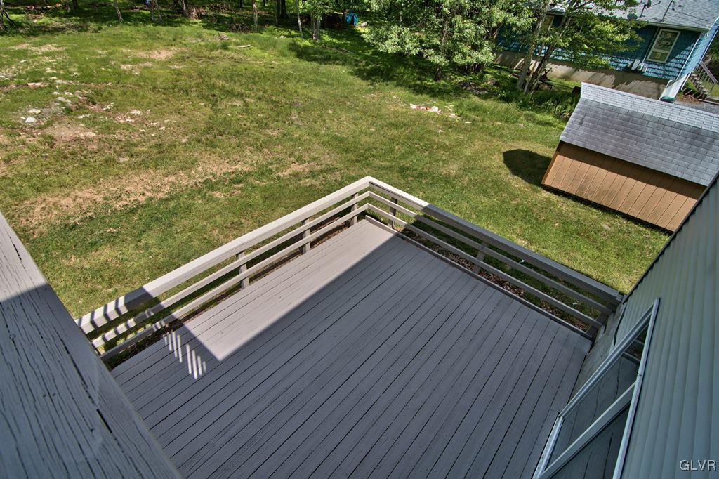 4913 Pine Ridge Drive West Bushkill, PA 18324 - Photo 47 of 50 View of the lower deck and yard from the upper dec