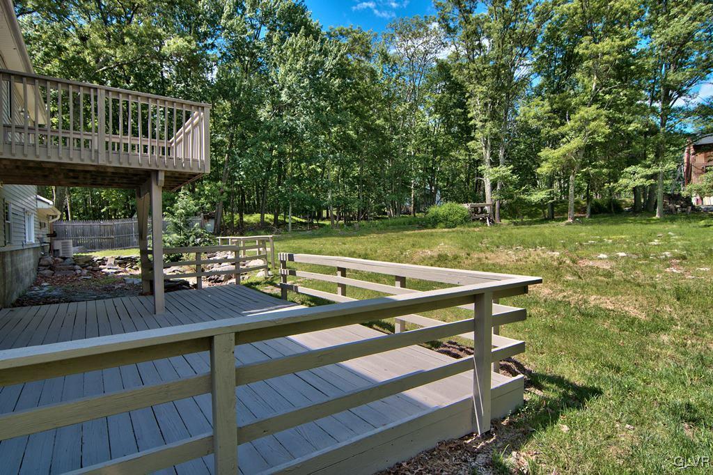 4913 Pine Ridge Drive West Bushkill, PA 18324 - Photo 48 of 50 View of the upper and lower decks from the side ya