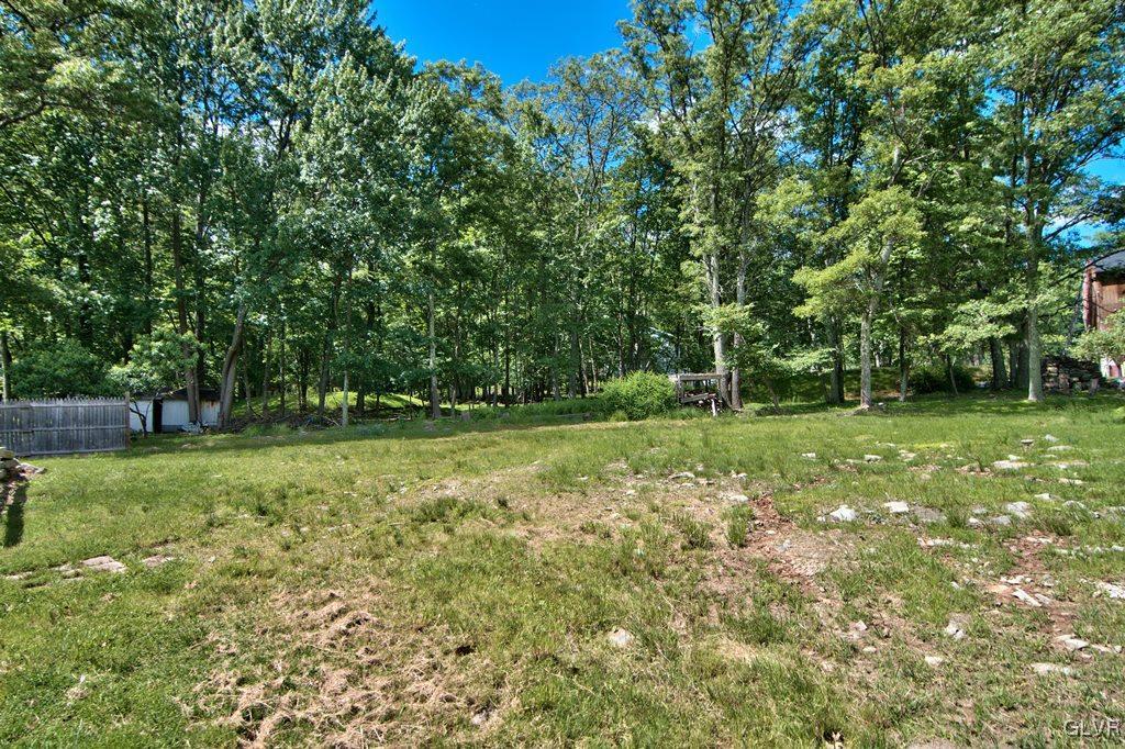 4913 Pine Ridge Drive West Bushkill, PA 18324 - Photo 49 of 50 The yard is flat and spacious for kids and pets.