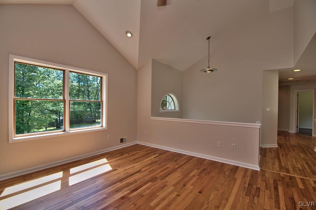 4913 Pine Ridge Drive West Bushkill, PA 18324 - Photo 6 of 50 The living room feature solid hardwood floors, a l