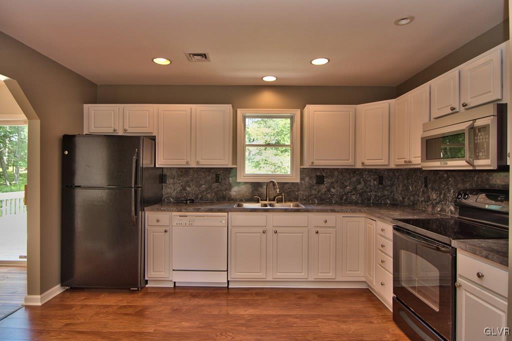 4913 Pine Ridge Drive West Bushkill, PA 18324 - Photo 7 of 50 The kitchen features laminate floors, recessed lig