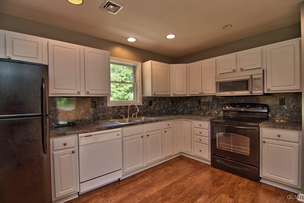 4913 Pine Ridge Drive West Bushkill, PA 18324 - Photo 8 of 50 The kitchen has plenty of cabinet & counter space