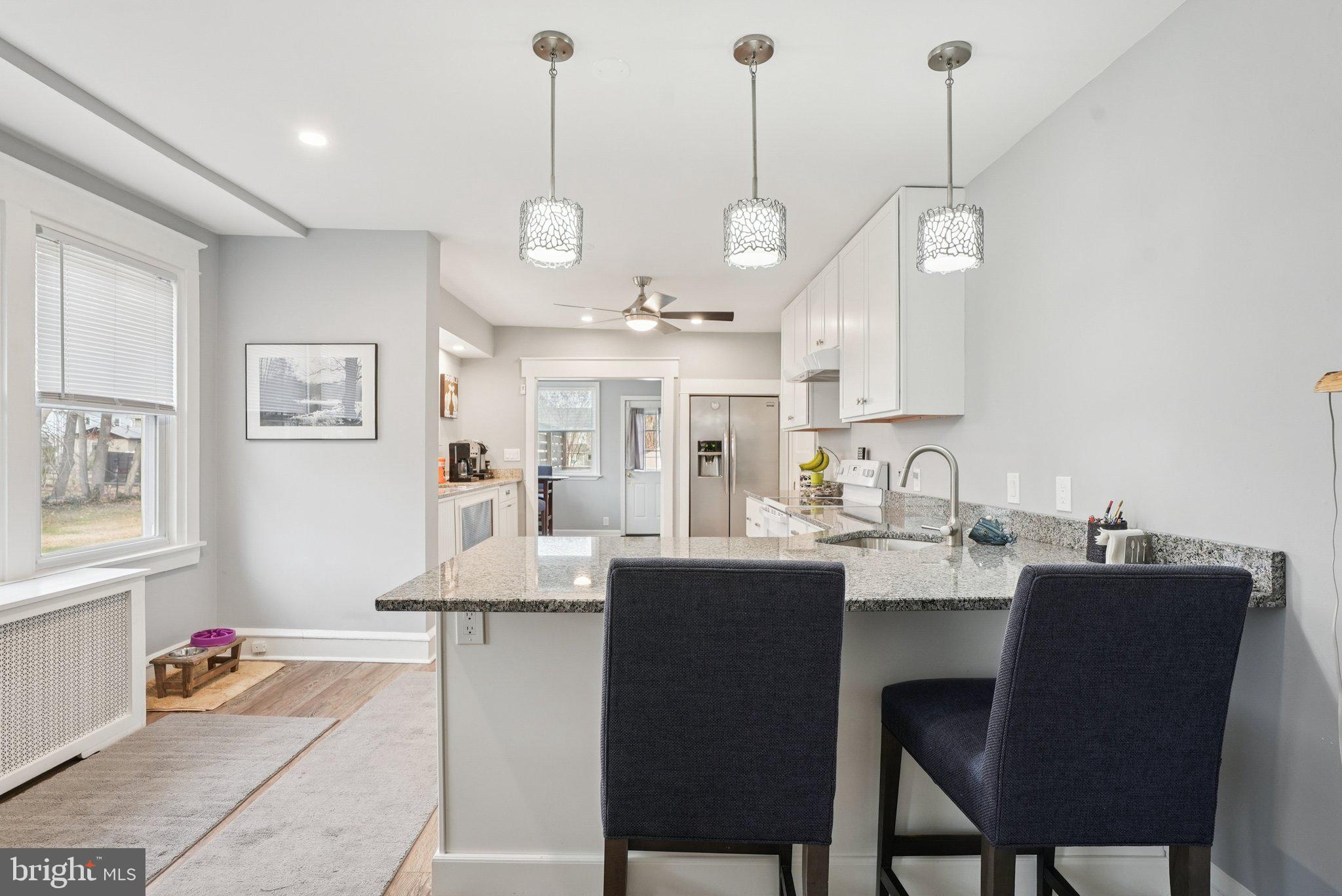 216-218 President Avenue Rutledge, PA 19070 - Photo 12 of 54 a large kitchen with a table and chairs