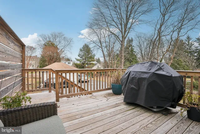 a view of a two chairs on the roof deck