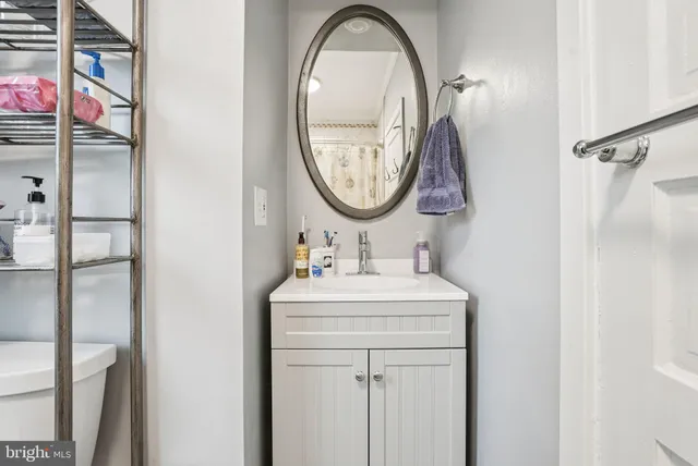 a utility room with dryer washer and a window