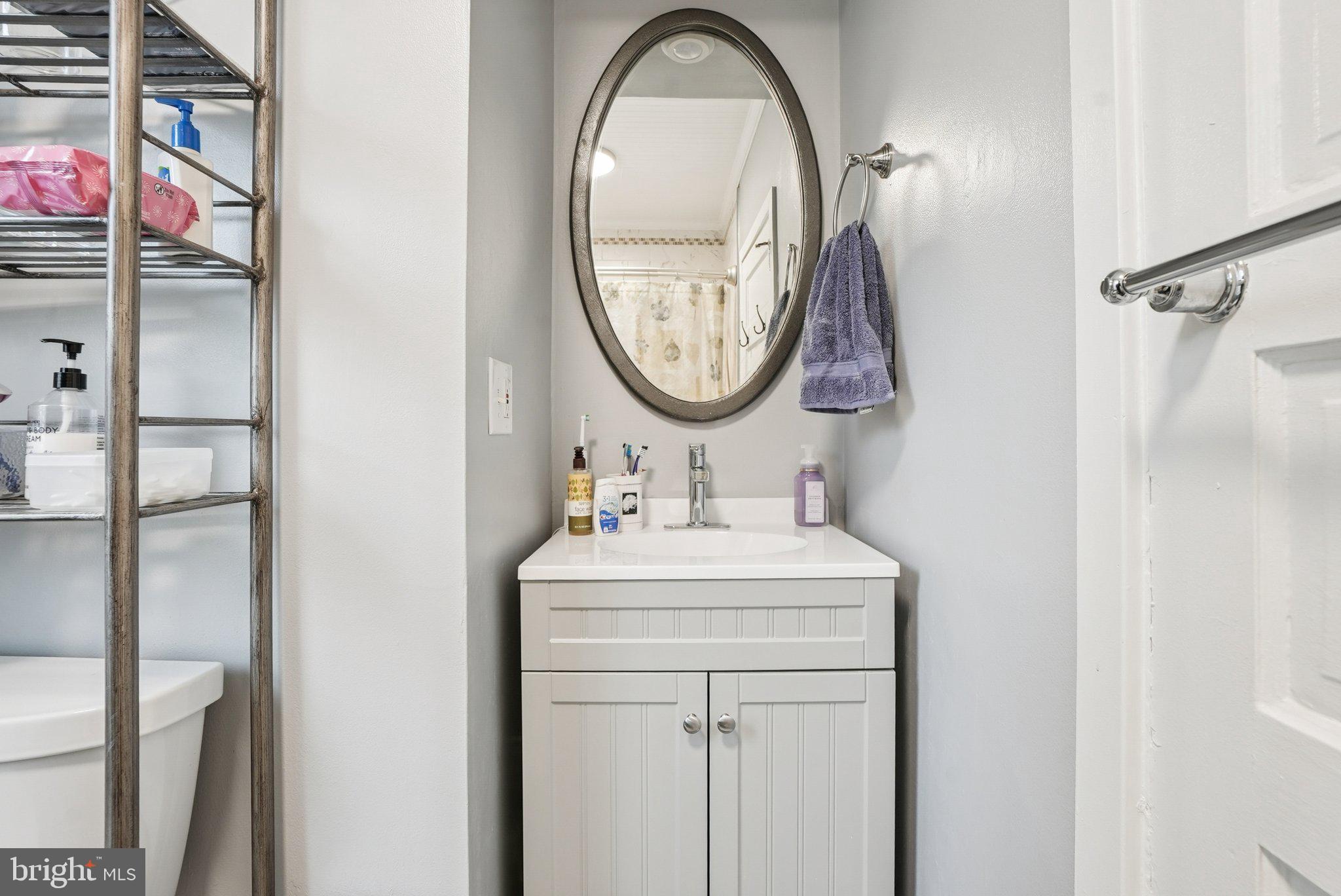 216-218 President Avenue Rutledge, PA 19070 - Photo 21 of 54 a bathroom with a sink and a mirror