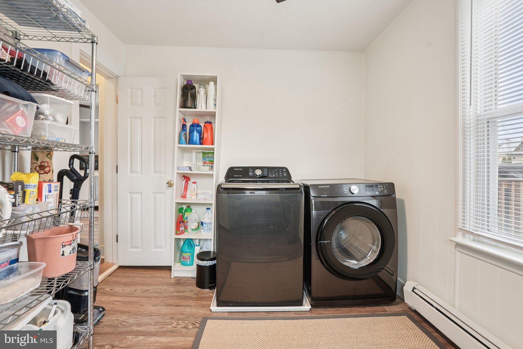 216-218 President Avenue Rutledge, PA 19070 - Photo 23 of 54 a utility room with dryer washer and a window