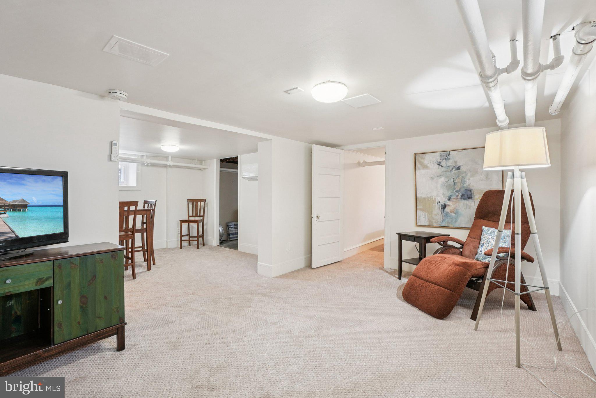 216-218 President Avenue Rutledge, PA 19070 - Photo 24 of 54 a view of a livingroom with furniture and a flat screen tv