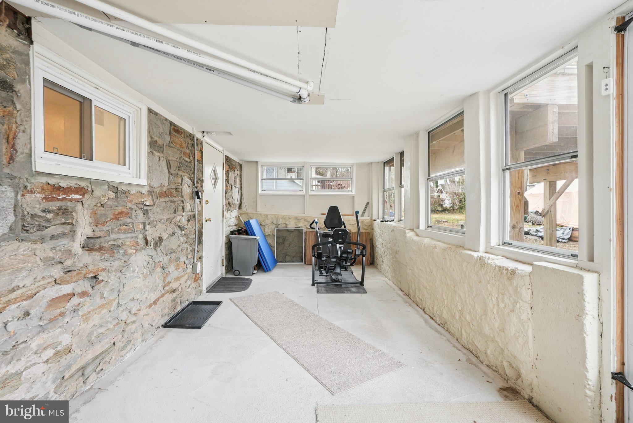 216-218 President Avenue Rutledge, PA 19070 - Photo 29 of 54 a view of a livingroom with furniture and a window