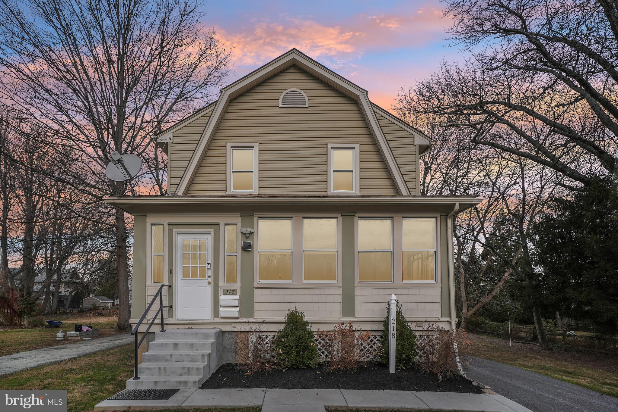 216-218 President Avenue Rutledge, PA 19070 - Photo 3 of 54 a front view of a house with a yard