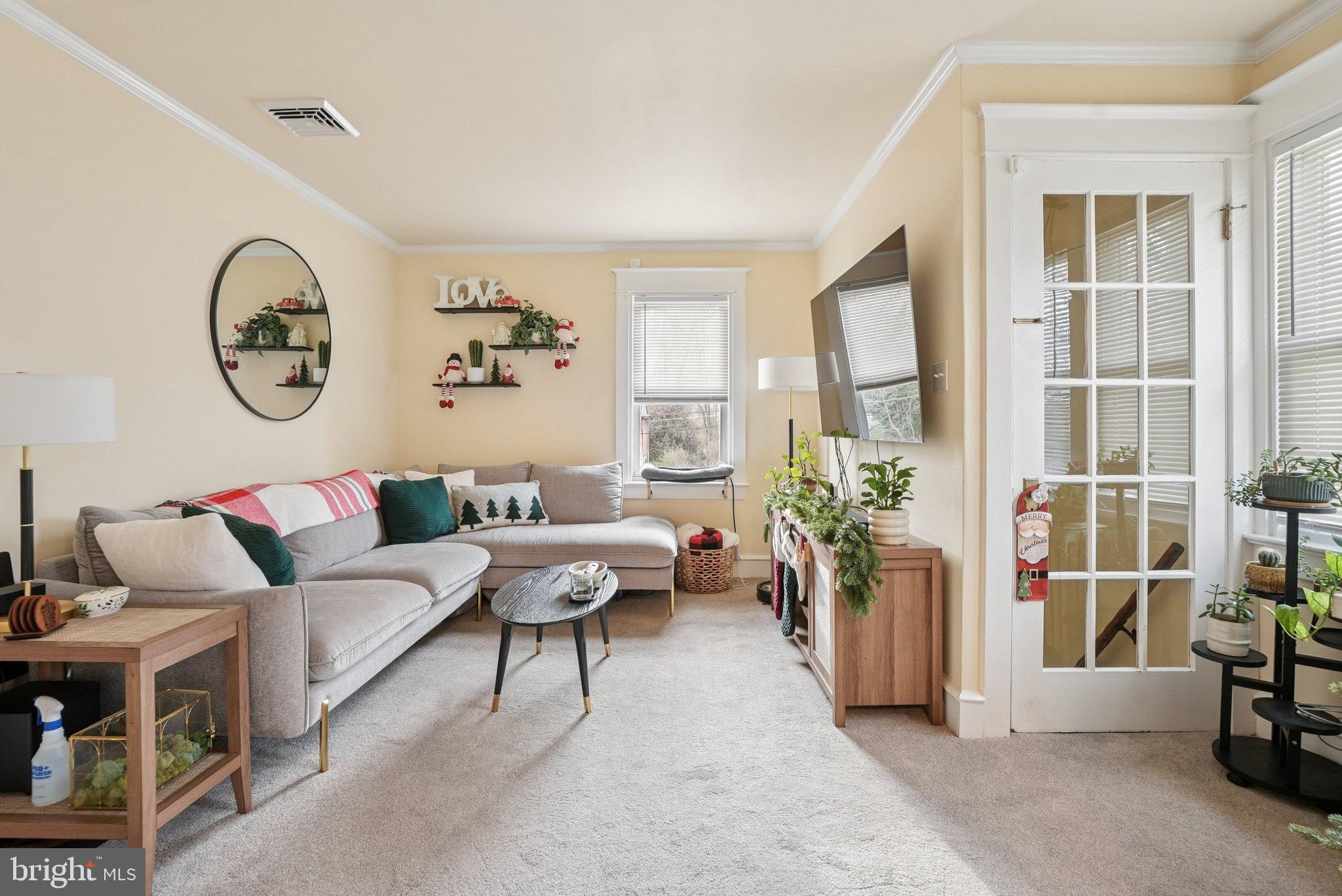 216-218 President Avenue Rutledge, PA 19070 - Photo 31 of 54 a living room with furniture and a window