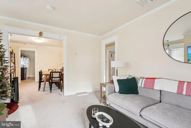 a kitchen with a refrigerator and a sink