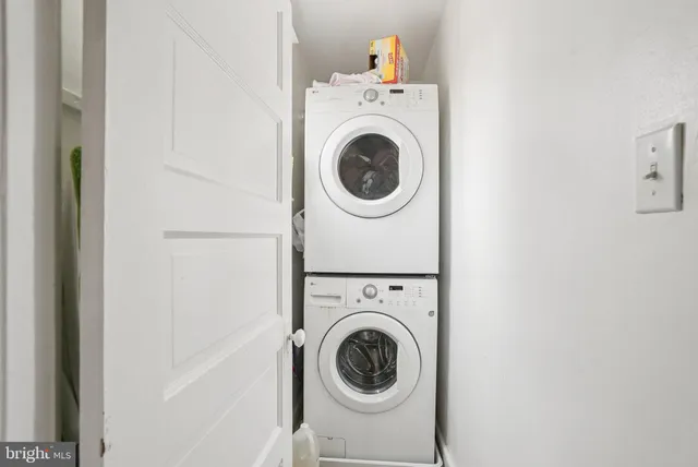 a bathroom with a sink vanity and a mirror
