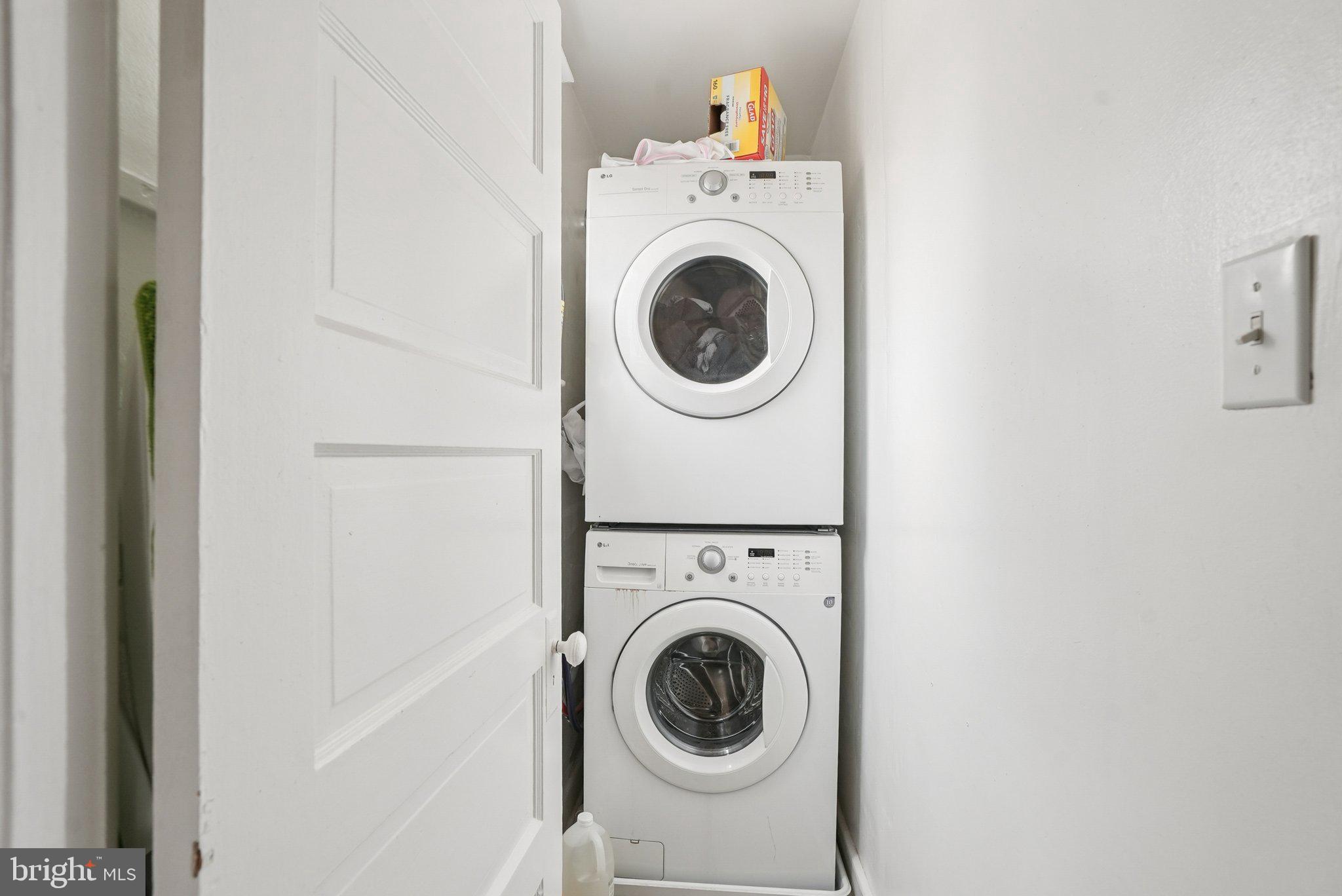 216-218 President Avenue Rutledge, PA 19070 - Photo 40 of 54 a utility room with dryer and washer