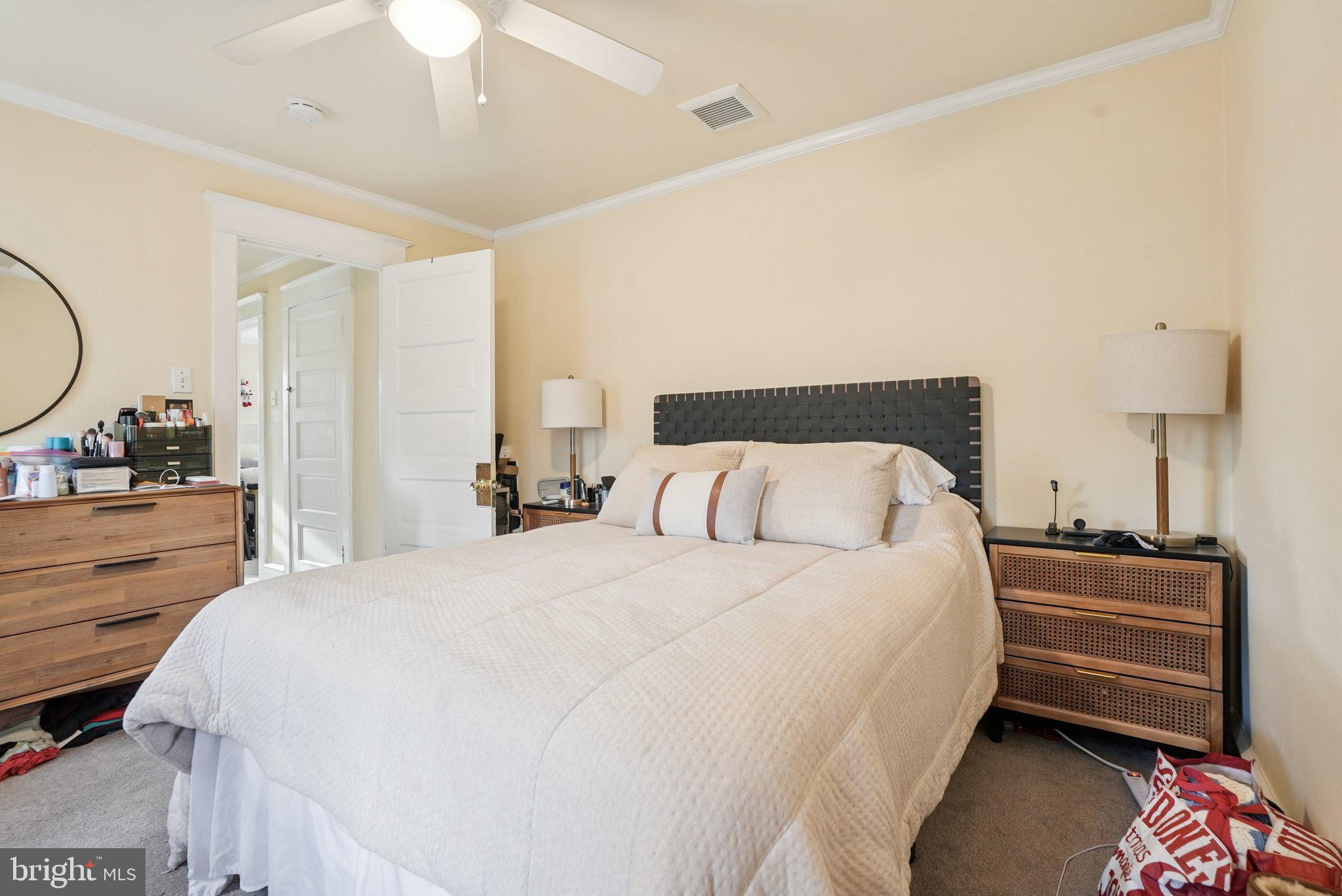 216-218 President Avenue Rutledge, PA 19070 - Photo 41 of 54 a bedroom with a bed and a dresser