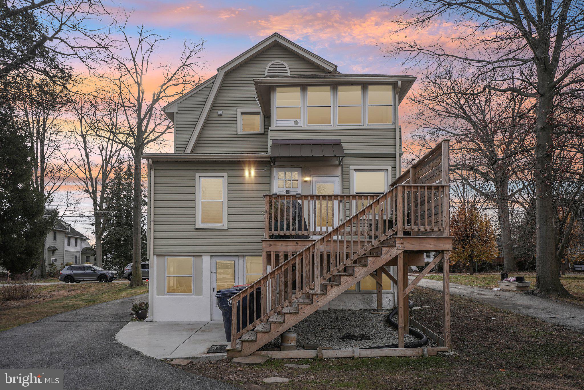 216-218 President Avenue Rutledge, PA 19070 - Photo 47 of 54 a front view of a house with a yard