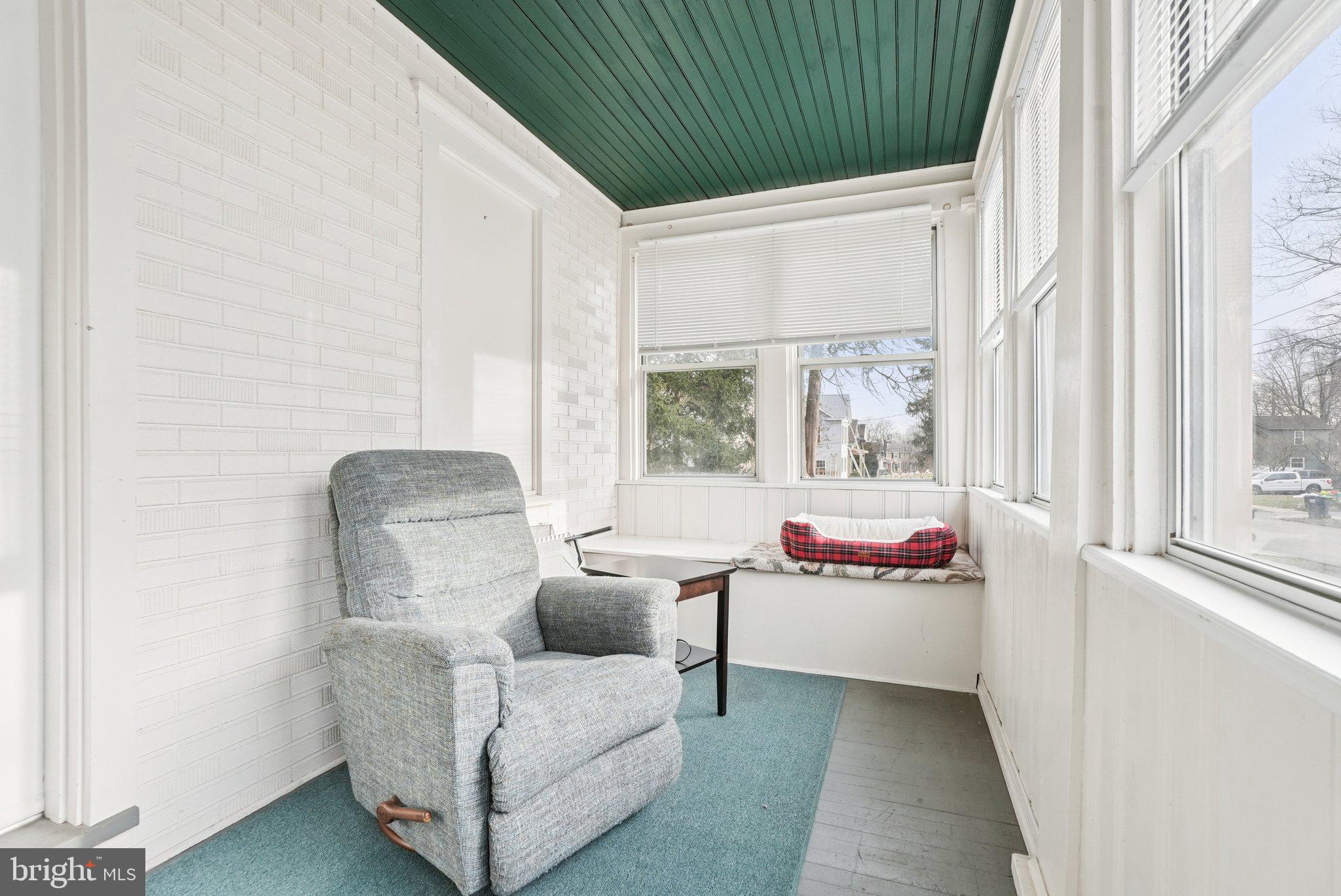 216-218 President Avenue Rutledge, PA 19070 - Photo 6 of 54 a living room with furniture and a large window