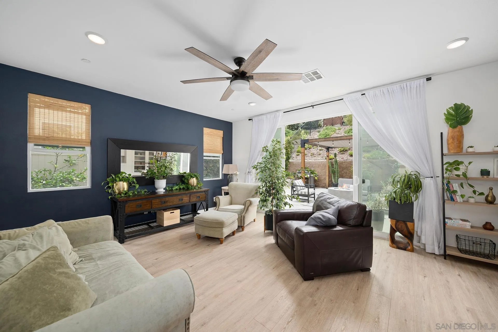 8850 Weston Road Santee, CA 92071 - Photo 13 of 44 a living room with furniture and a large window