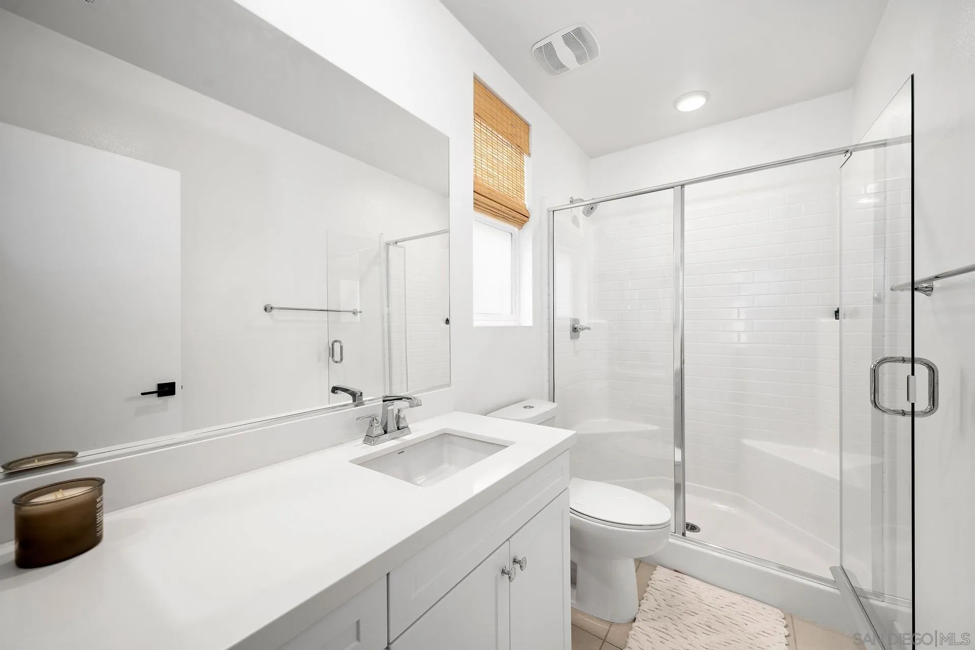 8850 Weston Road Santee, CA 92071 - Photo 18 of 44 a bathroom with a sink a toilet and shower