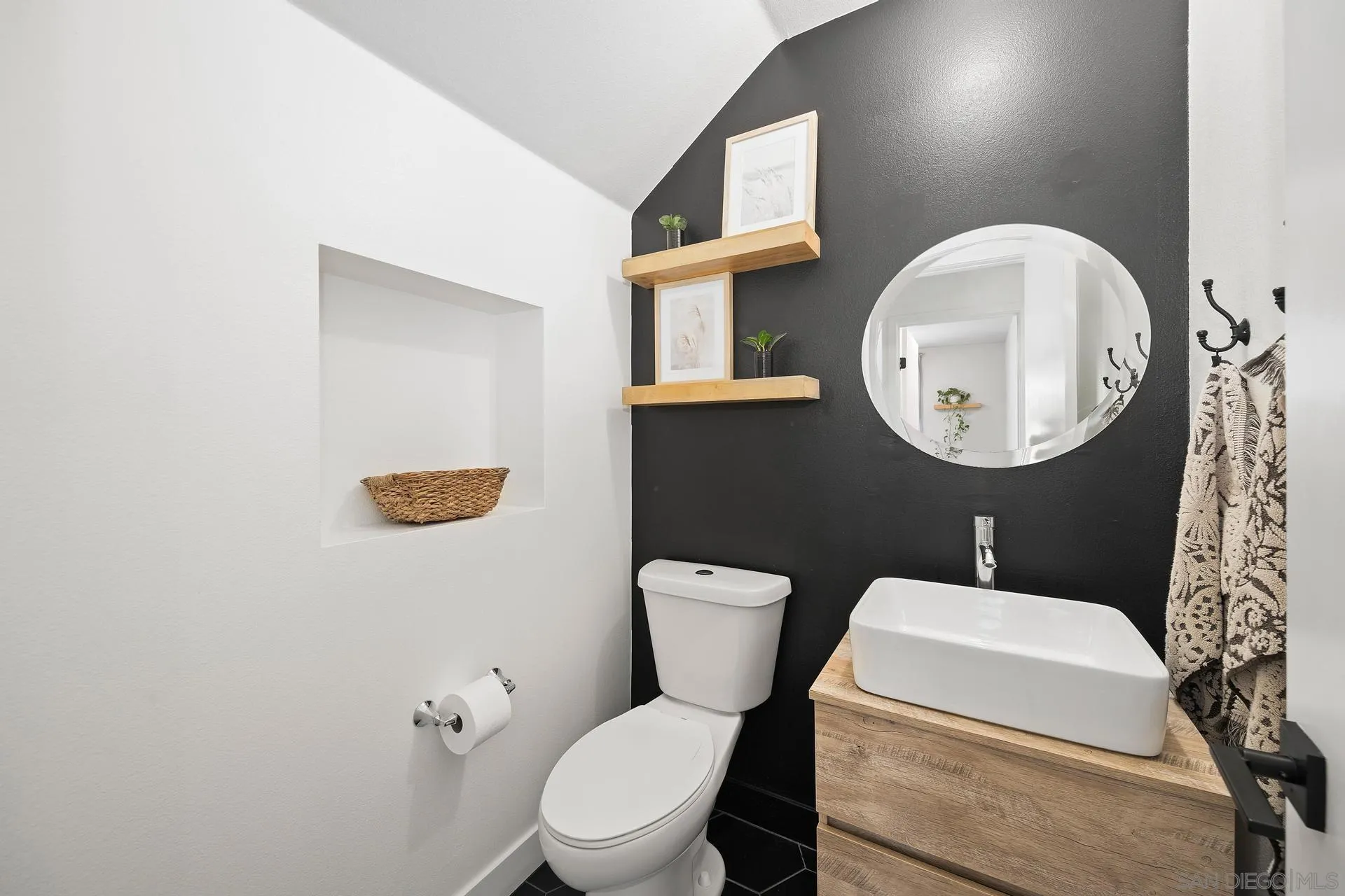 8850 Weston Road Santee, CA 92071 - Photo 19 of 44 a white toilet sitting next to a bathroom sink