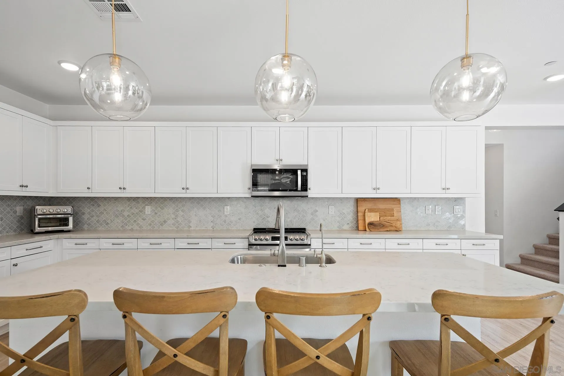 8850 Weston Road Santee, CA 92071 - Photo 8 of 44 a kitchen with stainless steel appliances granite countertop a sink and cabinets