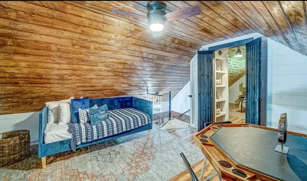 a view of a balcony with chairs