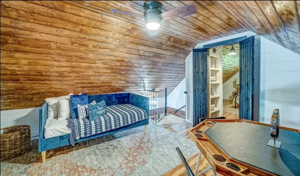 a view of a balcony with chairs