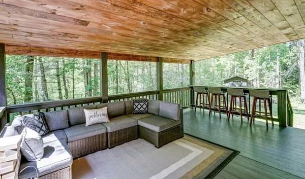 a view of swimming pool with seating space